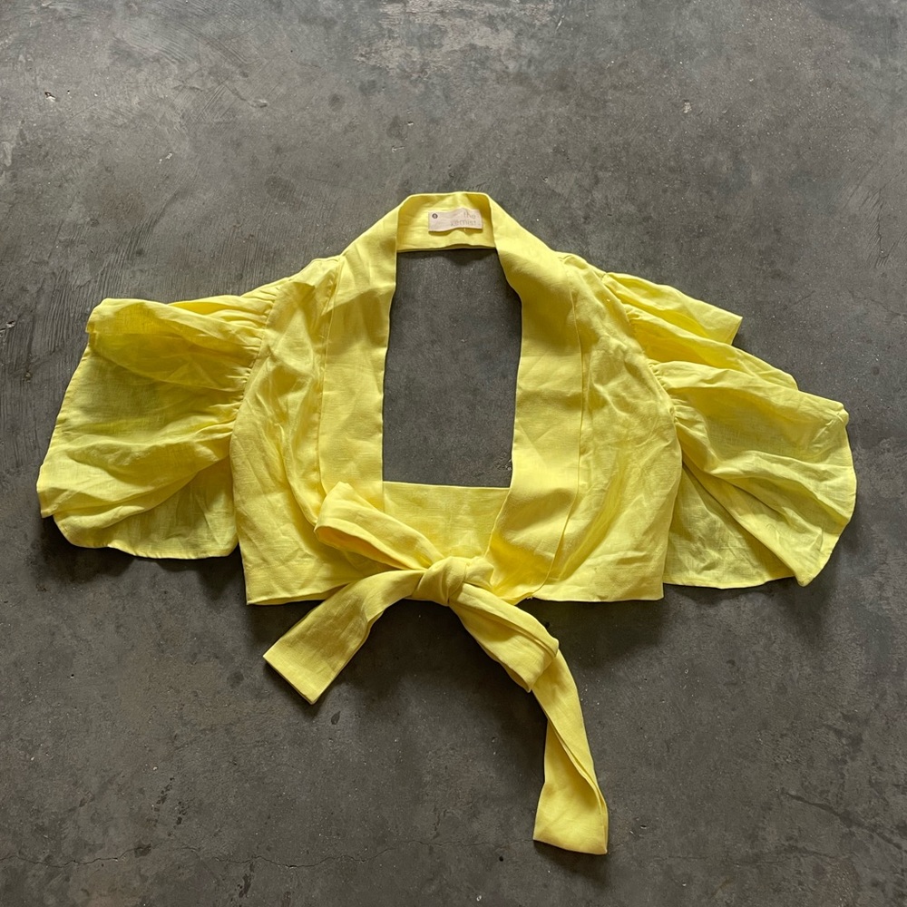 The Kemist Linen cropped tie blouse
.